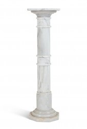 A VARIEGATED ALABASTER PEDESTA