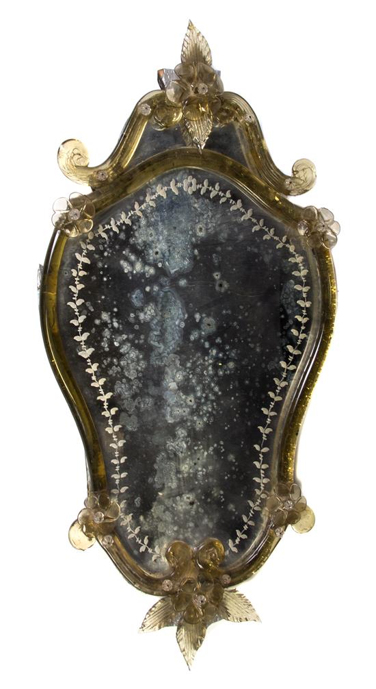*A Venetian Glass Mirror having a