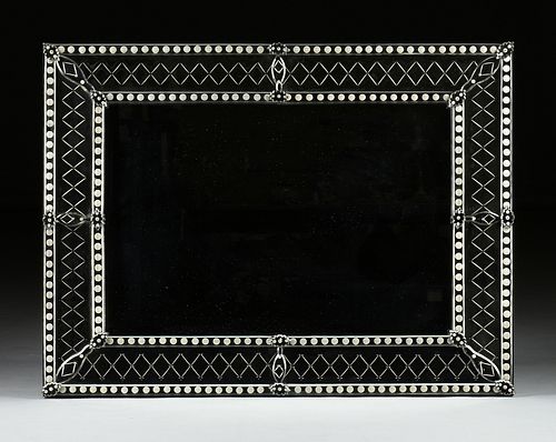 A VENETIAN STYLE ETCHED AND
