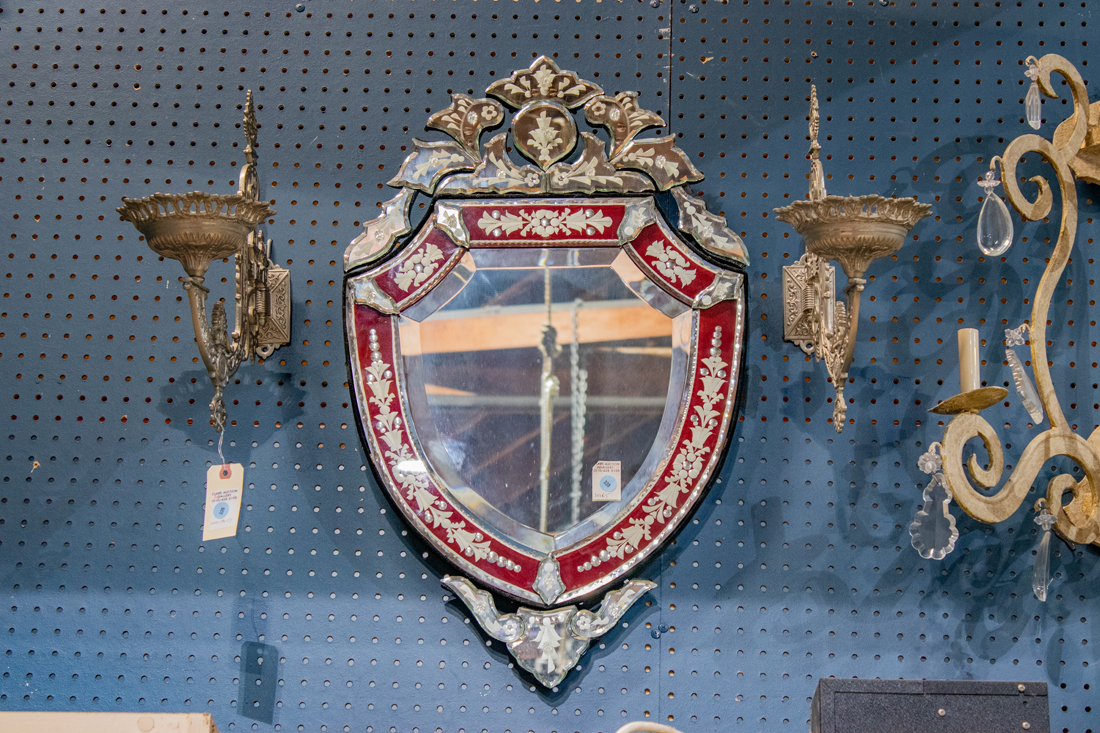 A VENTIAN GLASS WALL MIRROR A