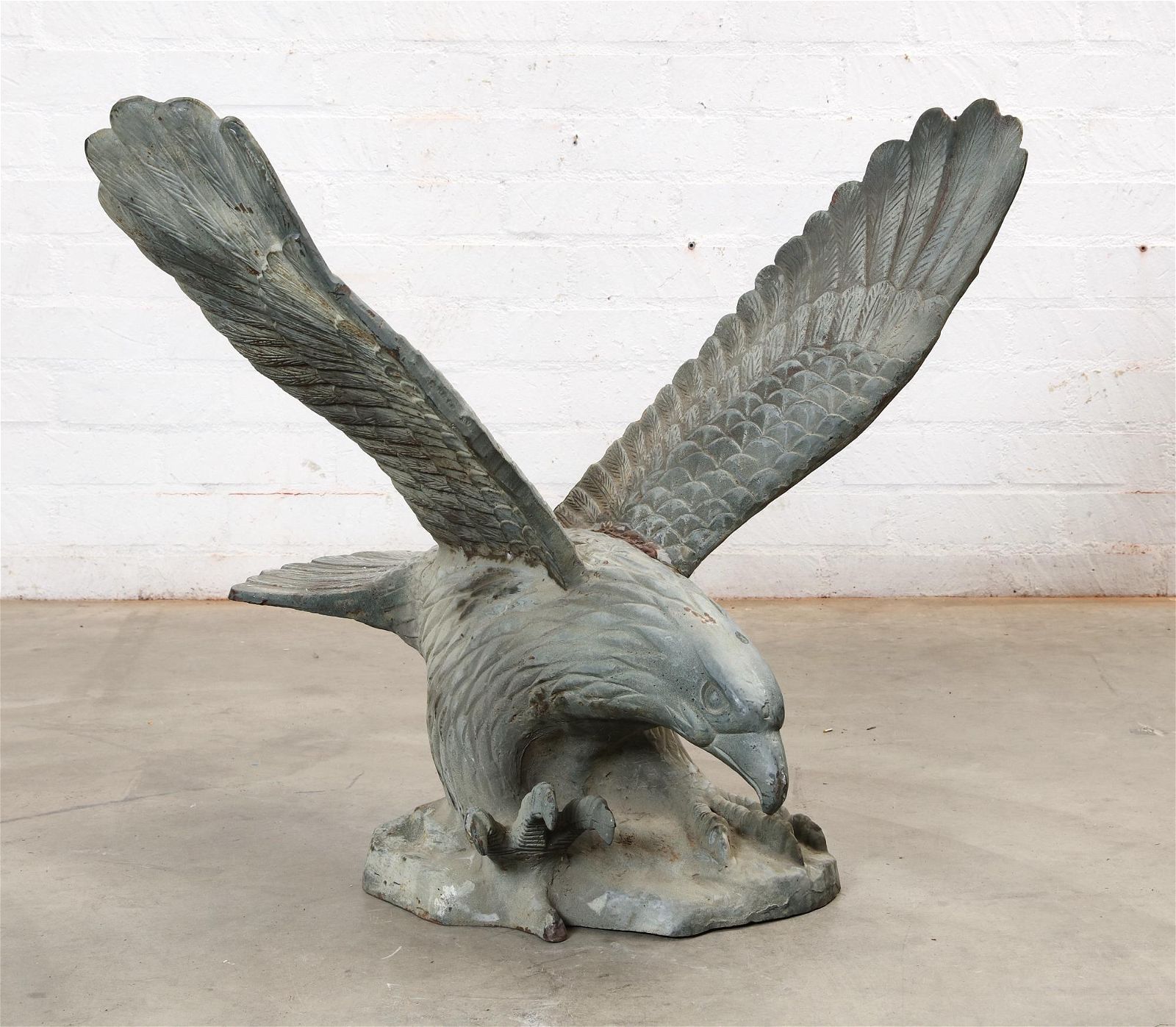 A VERDIGRIS METAL MODEL OF AN