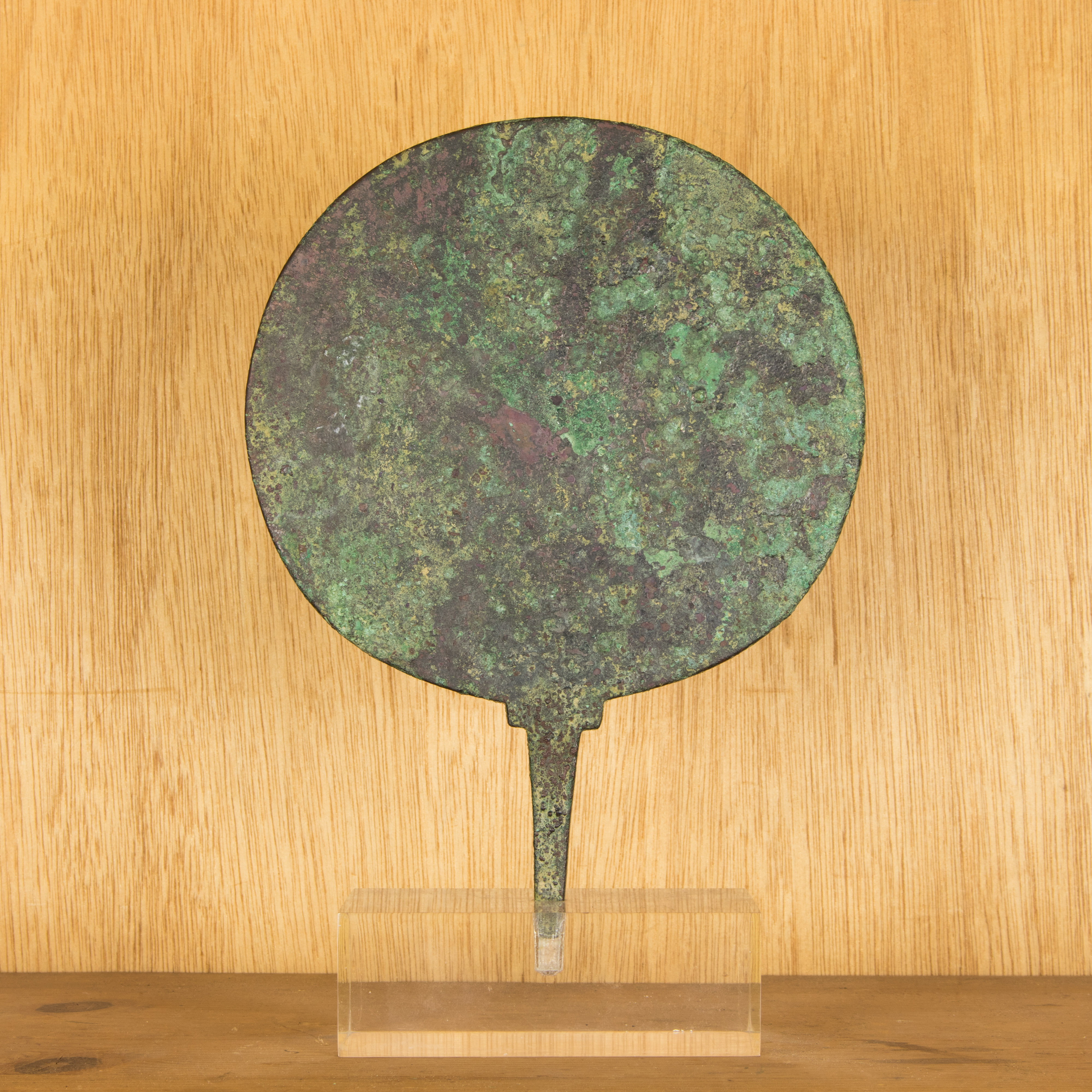 A VERDIGRIS PATINATED BRONZE MIRROR