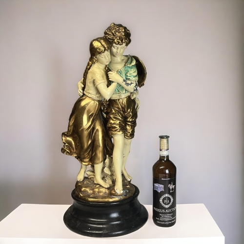 A VERY LARGE PAINTED SPELTER FIGURE