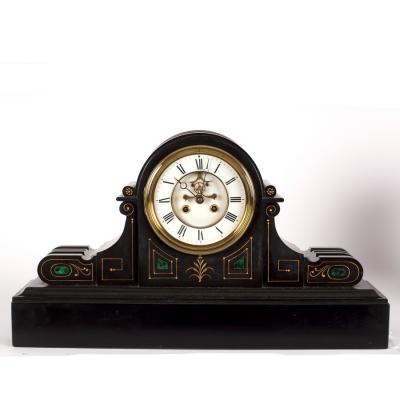 A Victorian black slate mantel