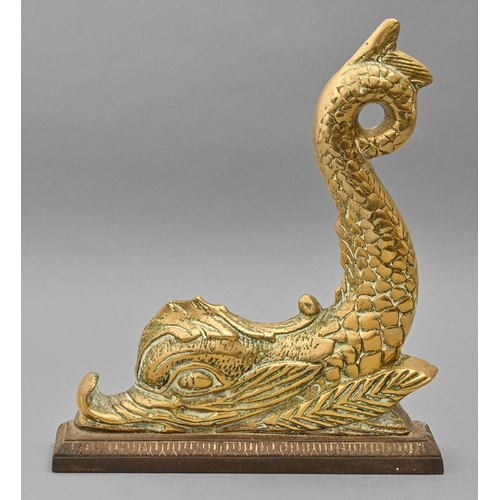A Victorian brass door stop in