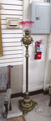 A VICTORIAN BRASS KEROSENE FLO