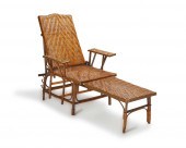 A VICTORIAN CANE RECLINING LOU