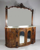 A Victorian carved and inlaid
