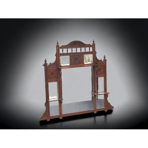 A VICTORIAN CARVED MAHOGANY