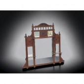 A VICTORIAN CARVED MAHOGANY MI