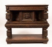 A Victorian carved oak court c