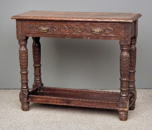 A Victorian carved oak