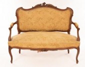 A Victorian carved walnut fram