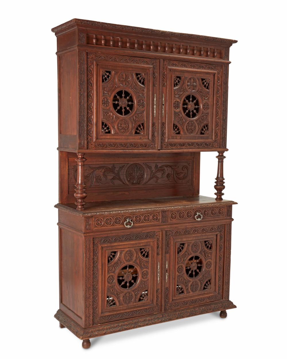 A VICTORIAN CARVED WALNUT