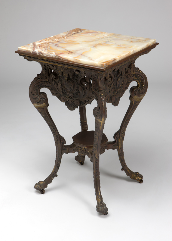 A Victorian cast brass center table