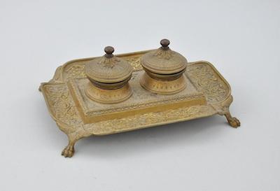 A Victorian Cast Brass Inkwell With