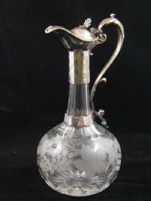 A Victorian claret jug the tall