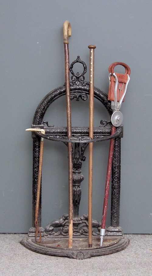 A Victorian ebonised cast iron