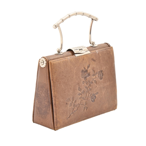 A Victorian EPNS mounted tooled