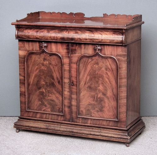 A Victorian figured mahogany tray