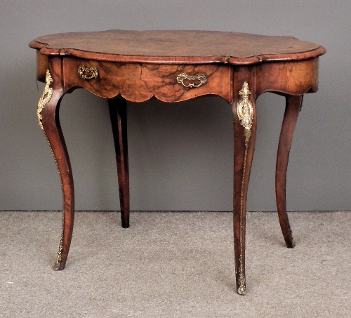 A Victorian figured walnut and gilt