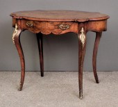 A Victorian figured walnut and