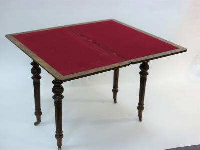 A Victorian figured walnut card