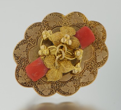 A Victorian Gold and Coral Brooch