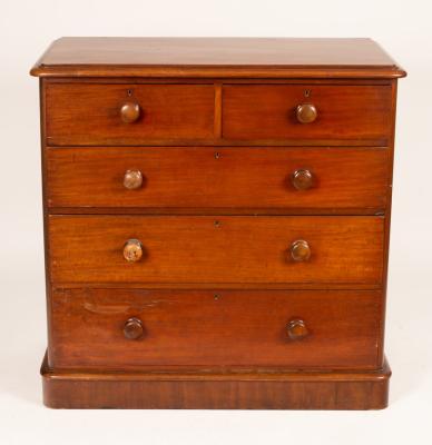 A Victorian mahogany chest of two