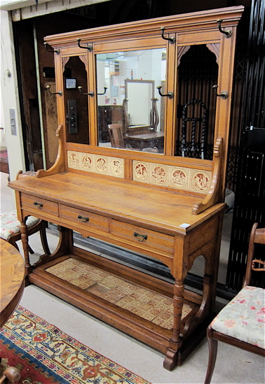 A VICTORIAN OAK AND CERAMIC TILE