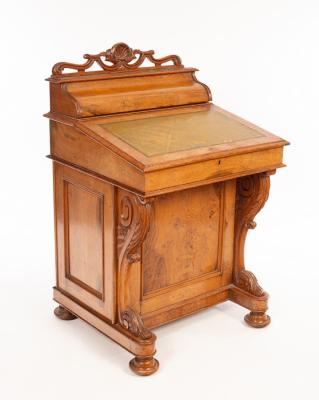 A Victorian oak Davenport with