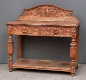 A Victorian oak serving table