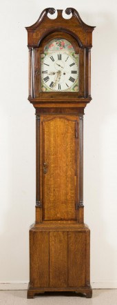 A VICTORIAN OAK TALL CASE FLOO