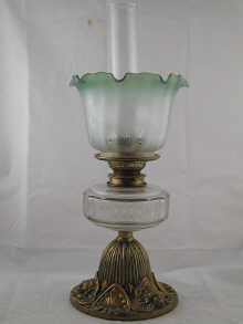 A Victorian oil lamp the facetted