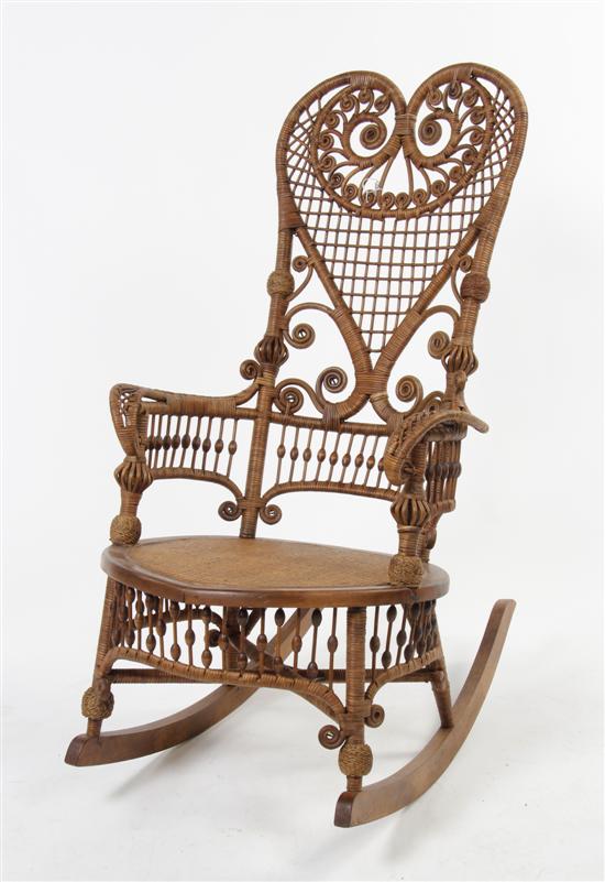 A Victorian Rattan Rocking Armchair