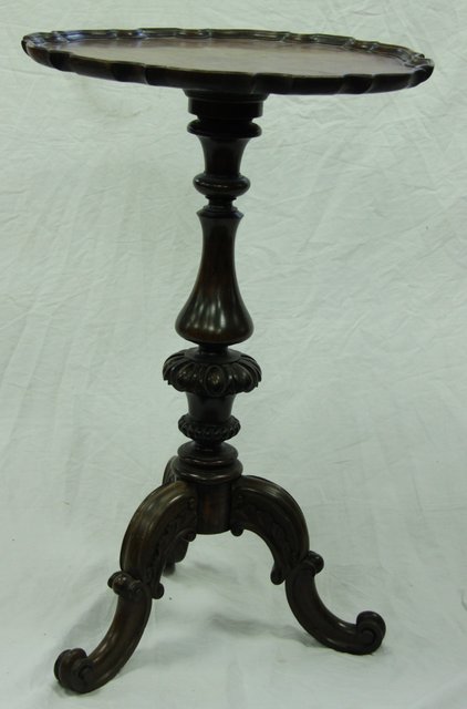 A Victorian rosewood circular table