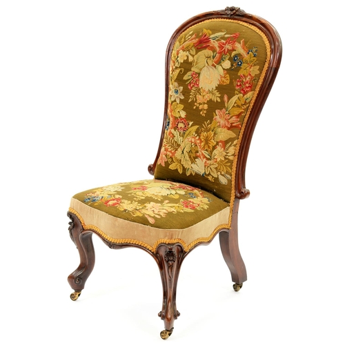 A Victorian rosewood nursing chair,
