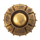 A VICTORIAN ROUND DOME BROOCH