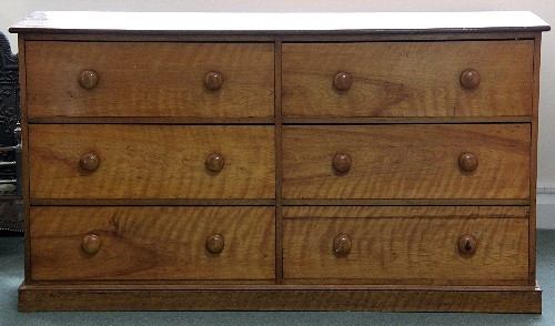 A Victorian satinwood chest