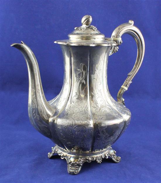 A Victorian silver coffee pot of