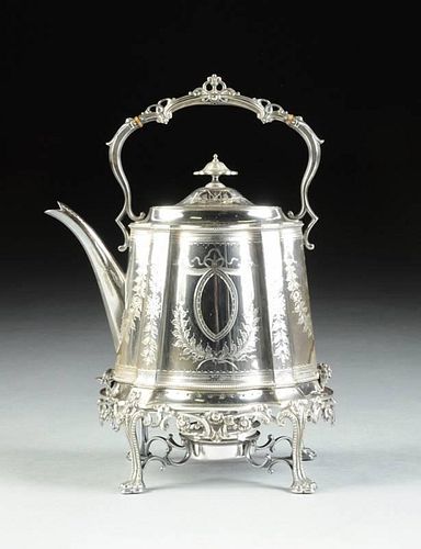 A VICTORIAN SILVER PLATED TEAPOT ON