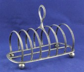 A Victorian silver seven bar t