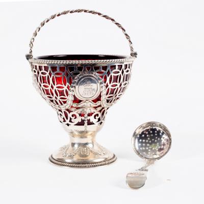 A Victorian silver sugar basket,