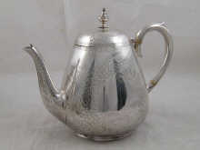 A Victorian silver teapot with