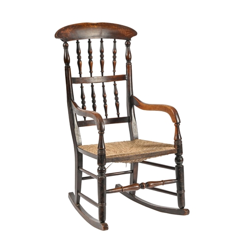 A Victorian stained beech rocking