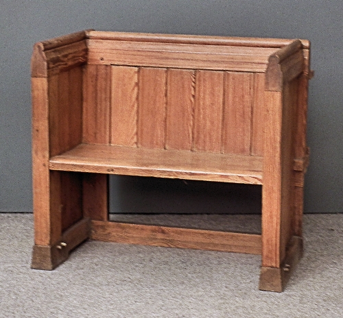 A Victorian stripped pitch pine pew