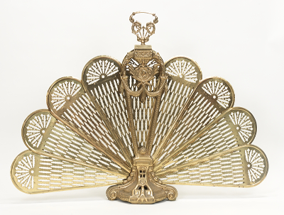 A Victorian Style Brass Fireplace