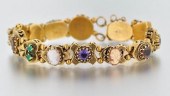 A Victorian Style Gold Slider