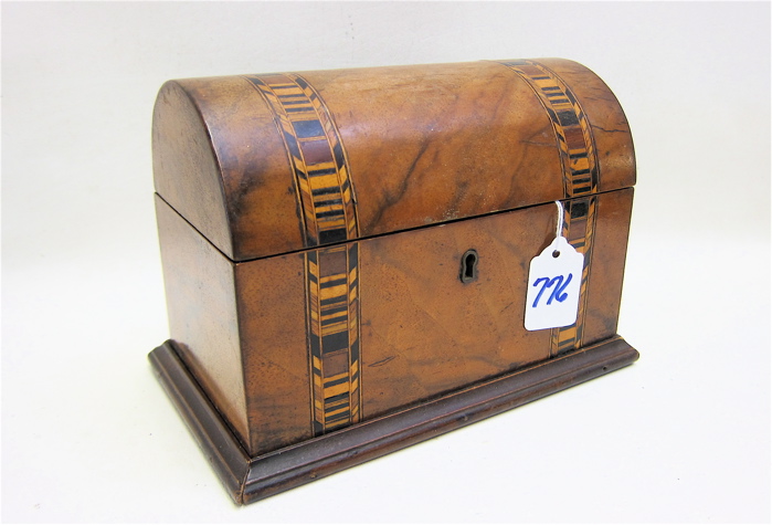 A VICTORIAN TEA CADDY of rounded