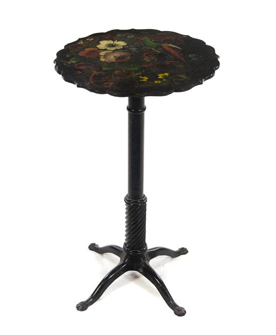 A Victorian Tilt-Top Table having a